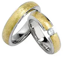 Zwei silber-goldene Ringe mit Brillanten